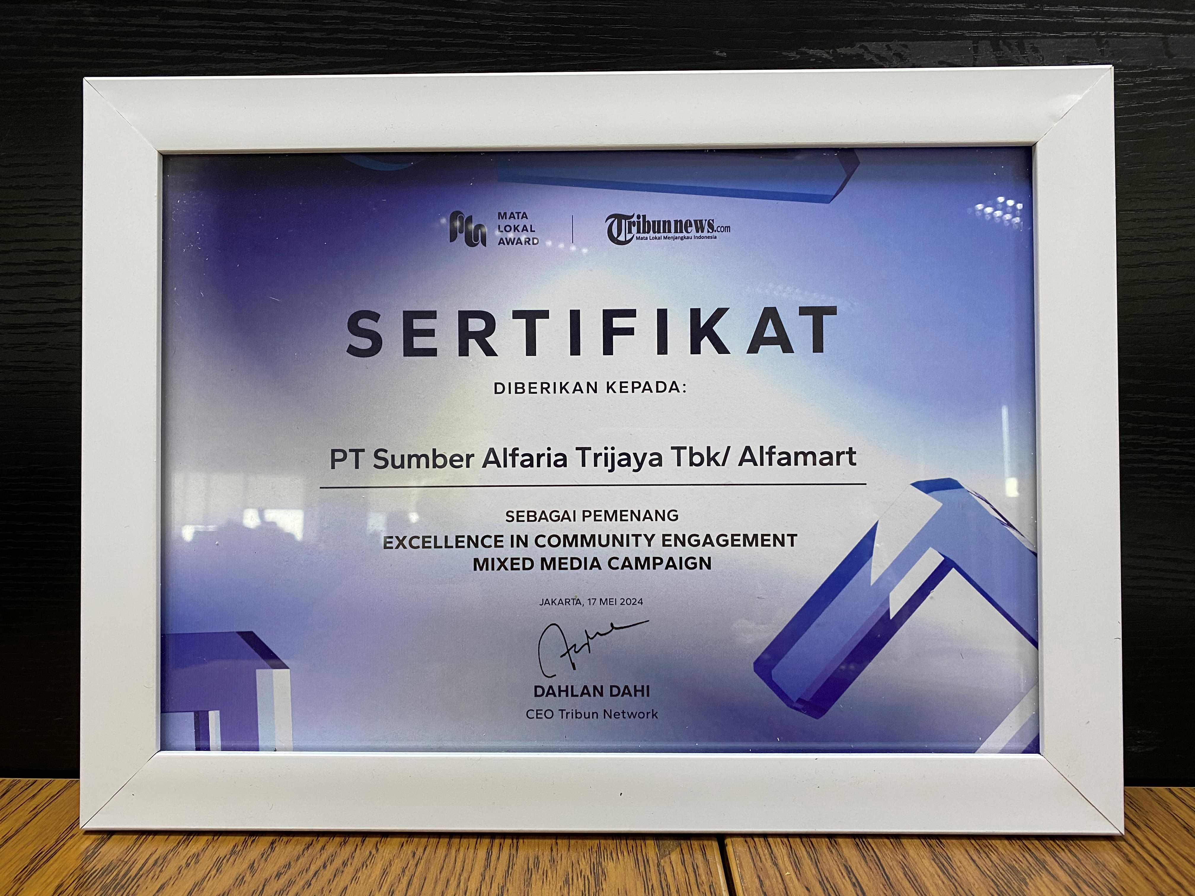 Image reward Excellence in Community Engagement Mixed Media Campaign dari Tribunnews.com